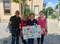 Volontari della Protezione civile di Malnate in missione all'asilo Frascoli di Gurone